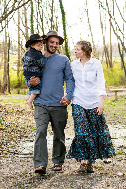 A young family walking at Baker Creek Preserve in Knoxville.