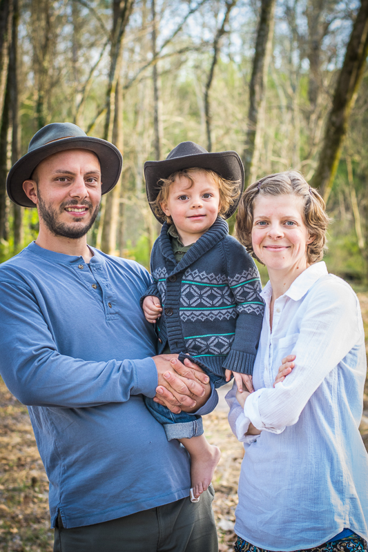 Portrait of a young family at Baker Creek Preserve in Knoxville.
