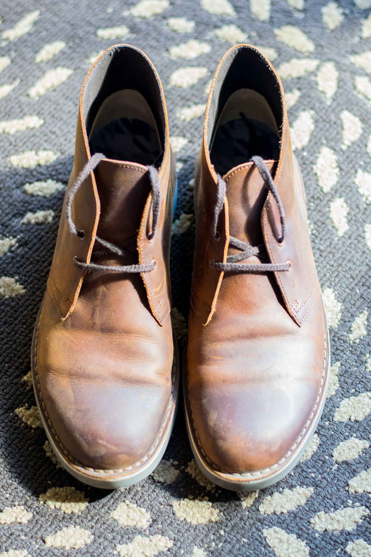 Groom's shoes in a Charleston hotel.