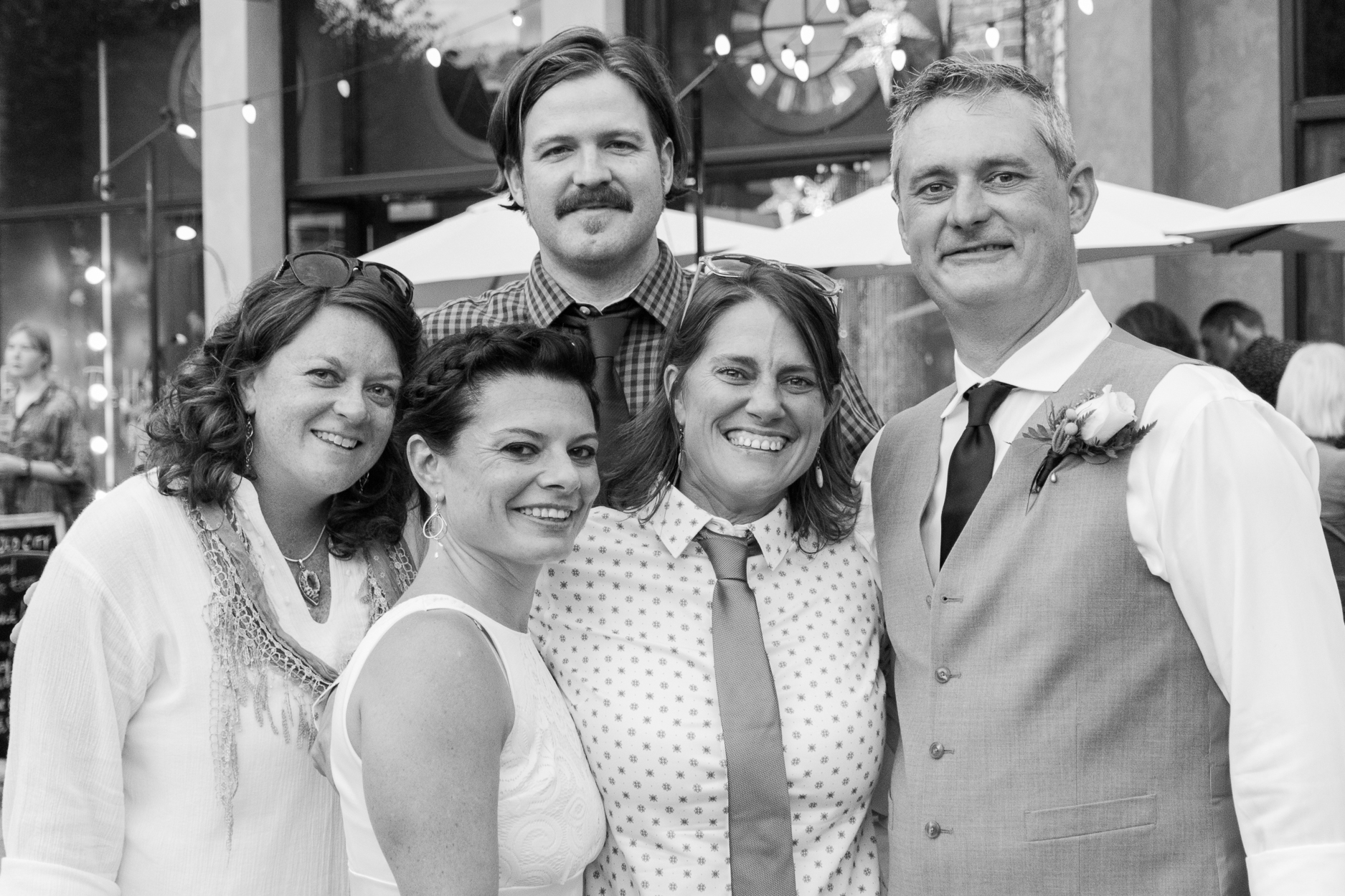 Bride and groom with friends at Market Square in Knoxville.