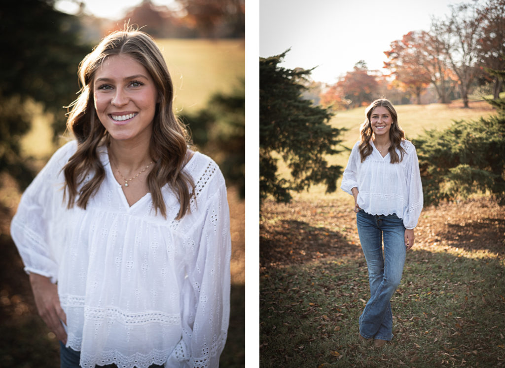 A female high school senior in a white blouse poses for senior portraits at Sequoyah Park in Knoxville.
