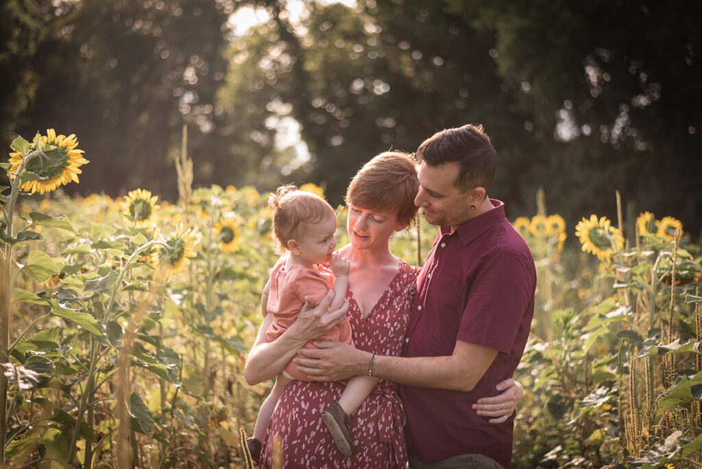 A family in the sunflowers at Forks of the River WMA in Knoxville.