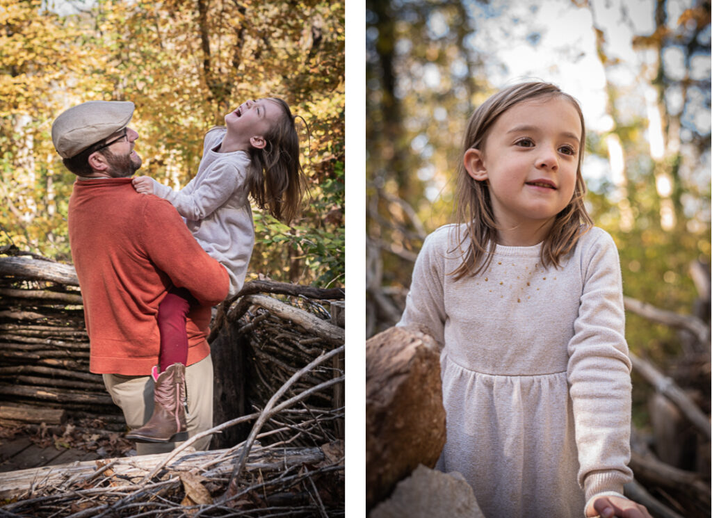 A young girl plays with her father in the woods.