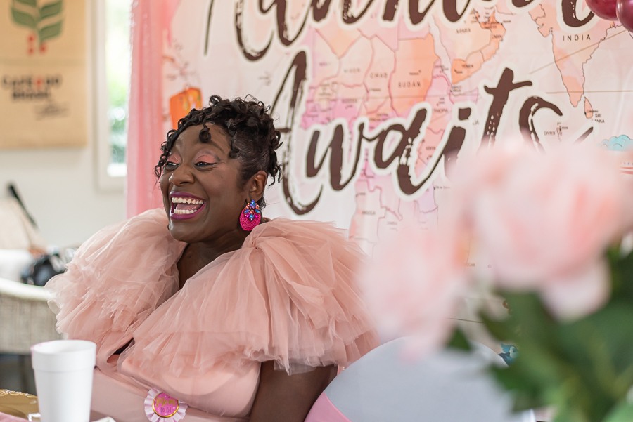 A woman is dressed in pink for her baby shower in Knoxville.